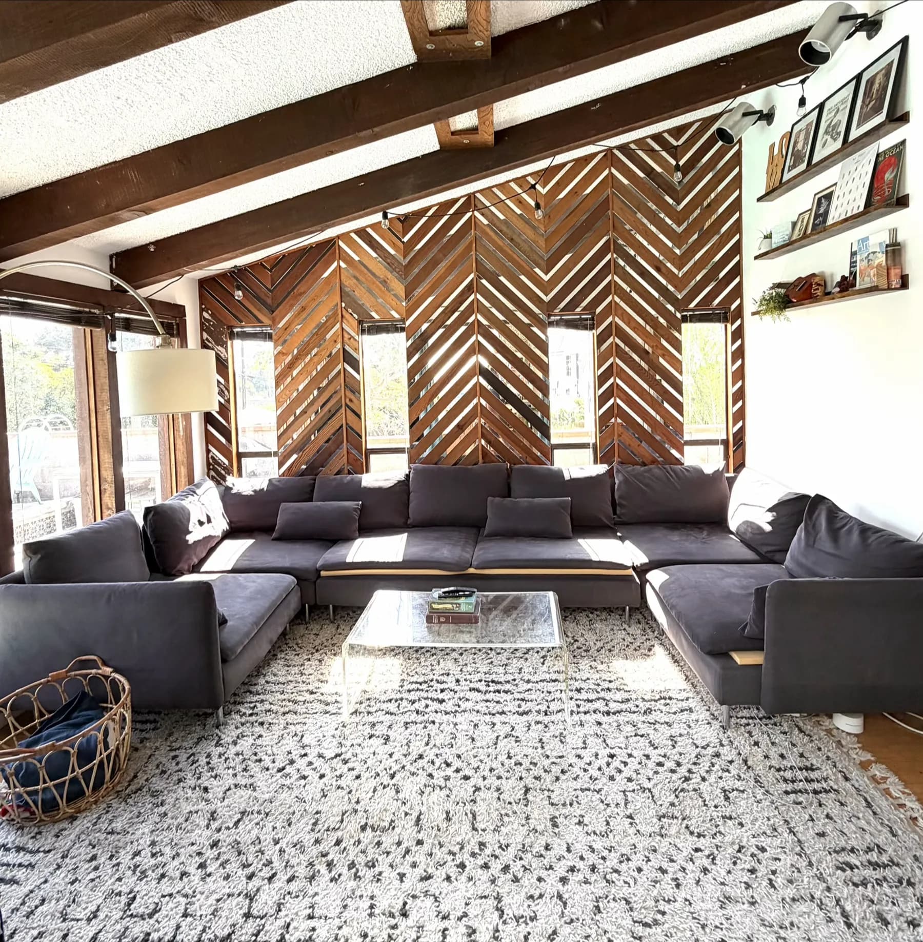 Bellbottom House den with chevron wood wall